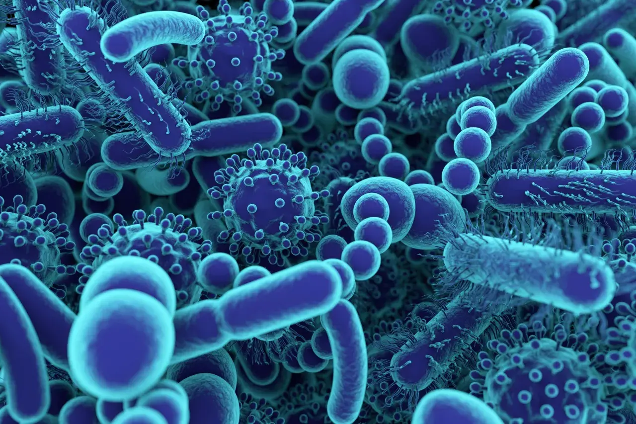 Un aperçu fascinant de ce qu'est un microbe : des bactéries allongées et des virus sphériques bleus, tous en mouvement.